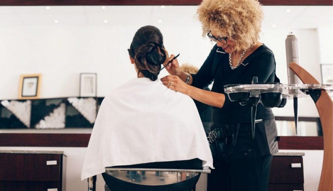 Celebrity Hair Stylists have ongoing styling to her client at the salon
