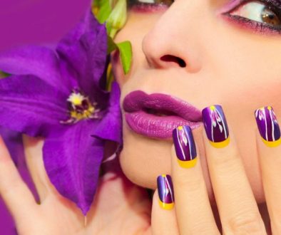 young model woman wearing violet nail printers