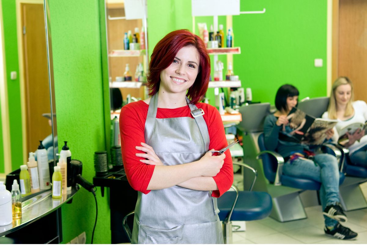 The hairstylist is happy while serving the customers and always follows the mission statement salon.