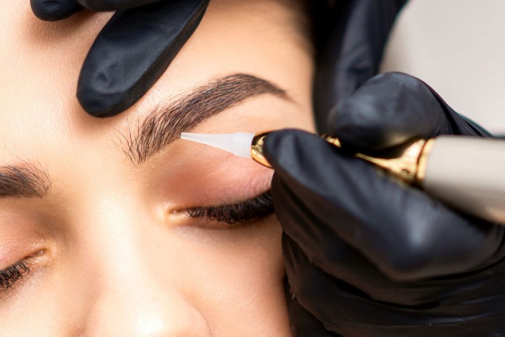The woman decides to have eyebrow treatments.