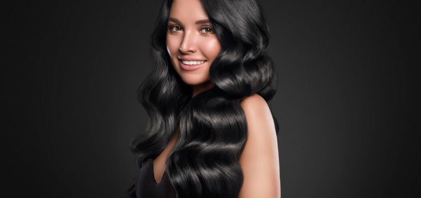 The deep and lustrous black shade radiates with the brilliance of the midnight sky. Stylists create this color by blending dark pigments and light-reflecting agents to create a glossy and dramatic hue.